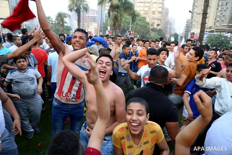 Egyptians celebrate Eid al-Fitr in Cairo, Egypt, on July 17, 2015. Eid al-Fitr marks the end of the Muslim holy month of Ramadan. Photo by Amr Sayed