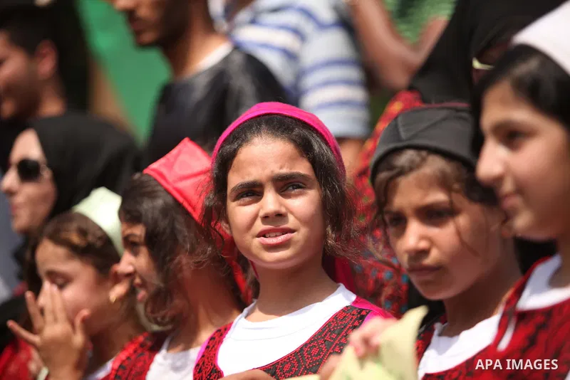 Palestinians take part in a rally to mark of the Palestinian heritage, in Gaza city , July 25, 2015. Photo by Ashraf Amra