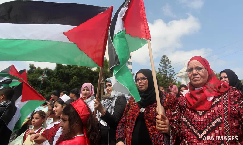 Palestinians take part in a rally to mark of the Palestinian heritage, in Gaza city , July 25, 2015. Photo by Ashraf Amra