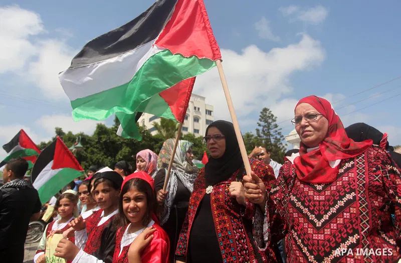 Palestinians take part in a rally to mark of the Palestinian heritage, in Gaza city , July 25, 2015. Photo by Ashraf Amra