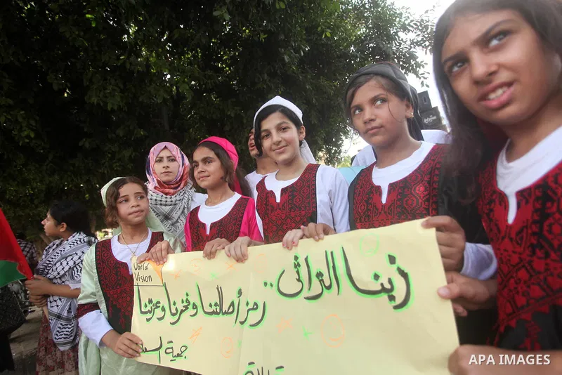 Palestinians take part in a rally to mark of the Palestinian heritage, in Gaza city , July 25, 2015. Photo by Ashraf Amra