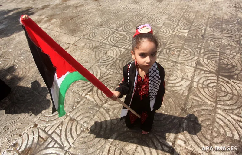 Palestinians take part in a rally to mark of the Palestinian heritage, in Gaza city , July 25, 2015. Photo by Ashraf Amra