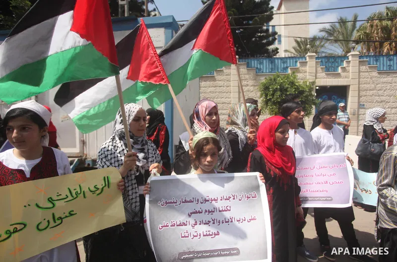 Palestinians take part in a rally to mark of the Palestinian heritage, in Gaza city , July 25, 2015. Photo by Ashraf Amra