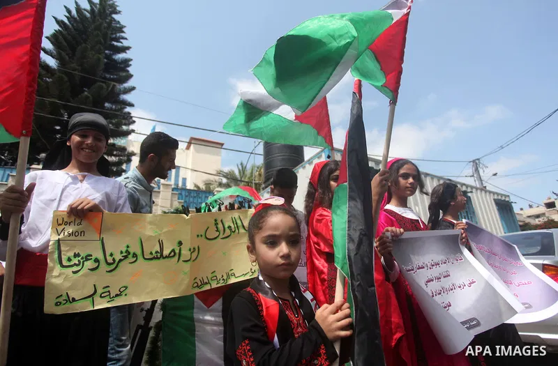 Palestinians take part in a rally to mark of the Palestinian heritage, in Gaza city , July 25, 2015. Photo by Ashraf Amra