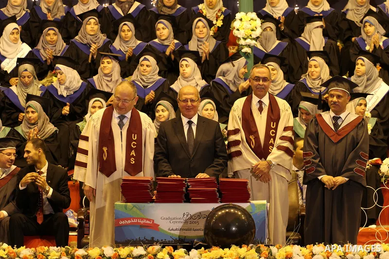 Palestinian students of the University collage of applied science, attend their graduation ceremony, in Gaza city on July 26, 2015. Photo by Mohammed Asad