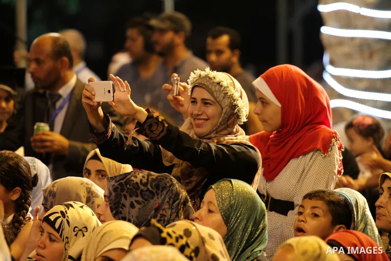 Palestinian students of the University collage of applied science, attend their graduation ceremony, in Gaza city on July 26, 2015. Photo by Mohammed Asad