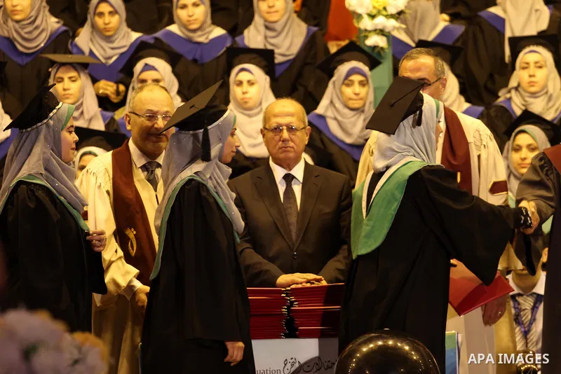 Palestinian students of the University collage of applied science, attend their graduation ceremony, in Gaza city on July 26, 2015. Photo by Mohammed Asad