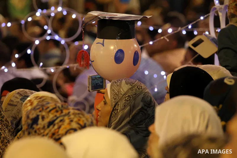 Palestinian students of the University collage of applied science, attend their graduation ceremony, in Gaza city on July 26, 2015. Photo by Mohammed Asad