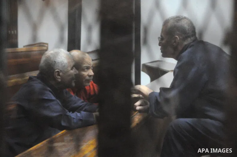 Members of Muslim Brotherhood group, attend their trial in a court in Cairo on July 27, 2015. Cairo Criminal court resumes on Monday, the trial of ousted President, Mohamed Morsi alongside 24 other prominent Brotherhood...