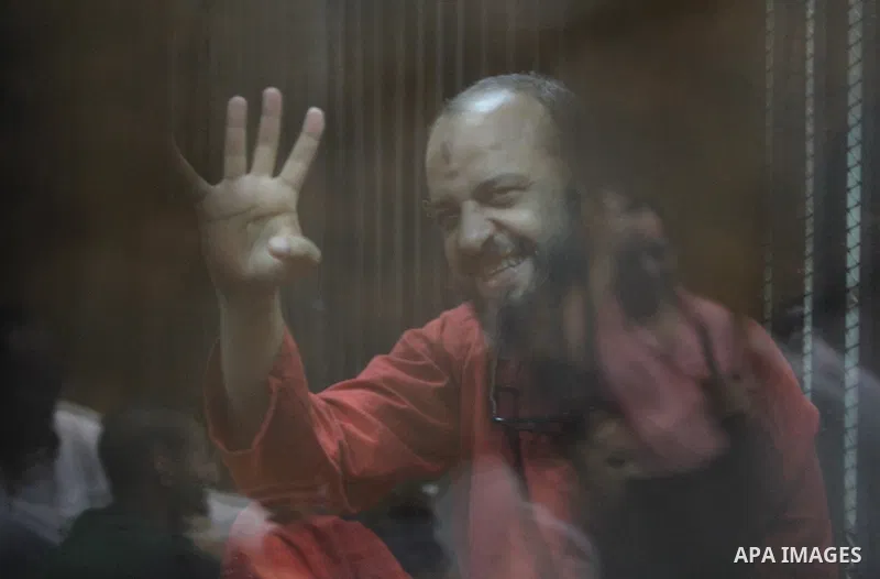 Members of Muslim Brotherhood group, attend their trial in a court in Cairo on July 27, 2015. Cairo Criminal court resumes on Monday, the trial of ousted President, Mohamed Morsi alongside 24 other prominent Brotherhood...