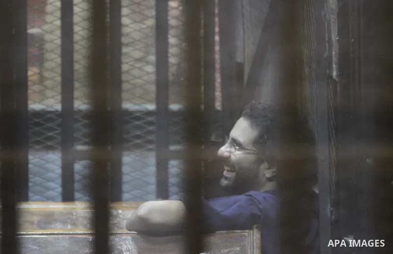 Members of Muslim Brotherhood group, attend their trial in a court in Cairo on July 27, 2015. Cairo Criminal court resumes on Monday, the trial of ousted President, Mohamed Morsi alongside 24 other prominent Brotherhood...