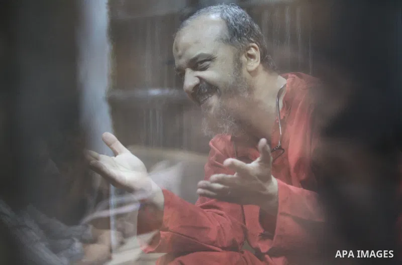 Members of Muslim Brotherhood group, attend their trial in a court in Cairo on July 27, 2015. Cairo Criminal court resumes on Monday, the trial of ousted President, Mohamed Morsi alongside 24 other prominent Brotherhood...