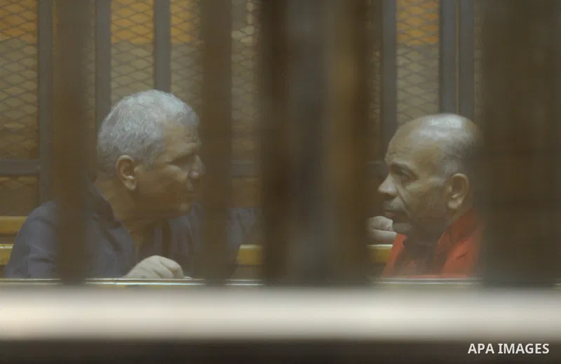 Members of Muslim Brotherhood group, attend their trial in a court in Cairo on July 27, 2015. Cairo Criminal court resumes on Monday, the trial of ousted President, Mohamed Morsi alongside 24 other prominent Brotherhood...