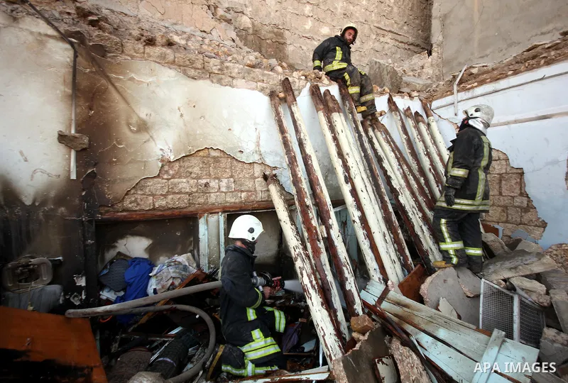 Syrians search for survivors amidst the rubble of a house after a reported missile fired by Syrian government forces hit a residential area in the Jeb Al-Qubbah district in the northern Syrian city of Aleppo on July 27,...