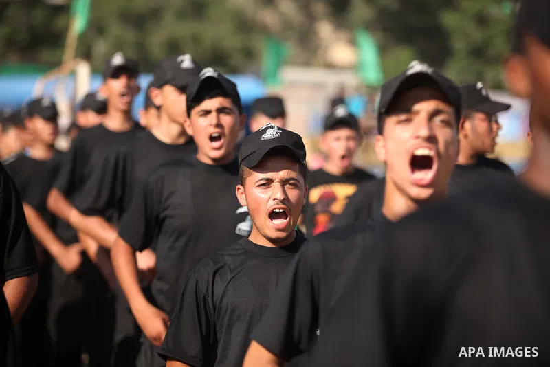 Palestinian youths demonstrate their skills during a military-style camp organized by the Hamas movement in Gaza City on July 28, 2015. Hamas's armed wing organized "Liberation Youths Camps" for young Palestinians aged b...