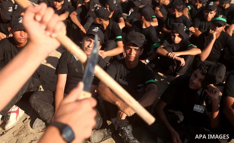 Palestinian youths demonstrate their skills during a military-style camp organized by the Hamas movement in Gaza City on July 28, 2015. Hamas's armed wing organized "Liberation Youths Camps" for young Palestinians aged b...