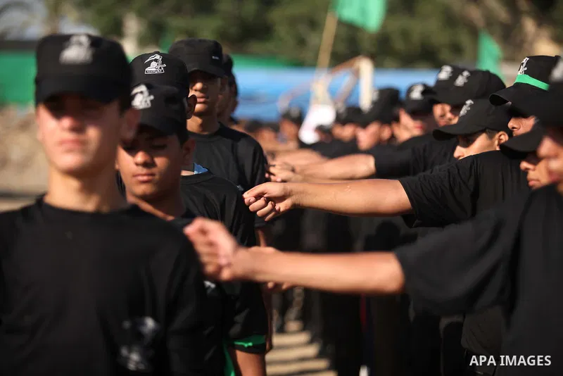 Palestinian youths demonstrate their skills during a military-style camp organized by the Hamas movement in Gaza City on July 28, 2015. Hamas's armed wing organized "Liberation Youths Camps" for young Palestinians aged b...