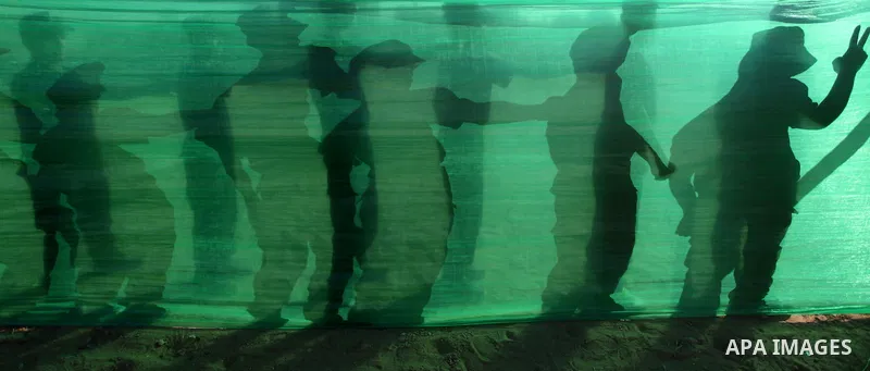 Palestinian youths demonstrate their skills during a military-style camp organized by the Hamas movement in Gaza City on July 28, 2015. Hamas's armed wing organized "Liberation Youths Camps" for young Palestinians aged b...