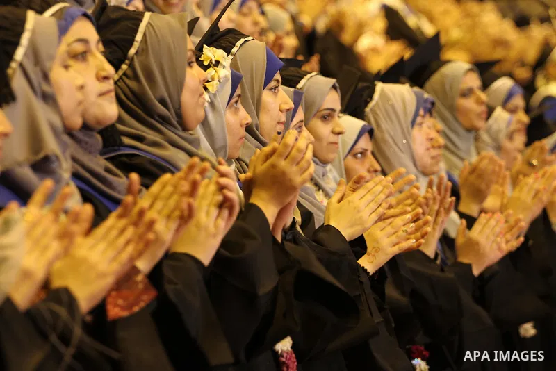 Palestinian students of the University collage of applied science, attend their graduation ceremony, in Gaza city on July 28, 2015. Photo by Mohammed Asad