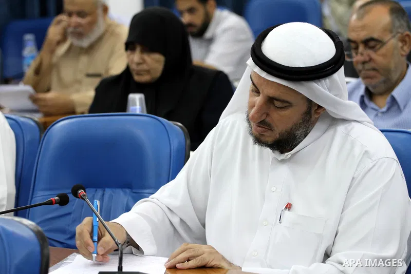 Members of the Palestinian legislative council from Hamas movement attend a meeting at the legislative council in Gaza city on July 29, 2015. Photo by Mohammed Asad