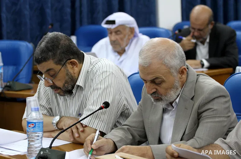 Members of the Palestinian legislative council from Hamas movement attend a meeting at the legislative council in Gaza city on July 29, 2015. Photo by Mohammed Asad