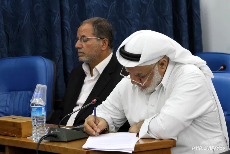 Members of the Palestinian legislative council from Hamas movement attend a meeting at the legislative council in Gaza city on July 29, 2015. Photo by Mohammed Asad