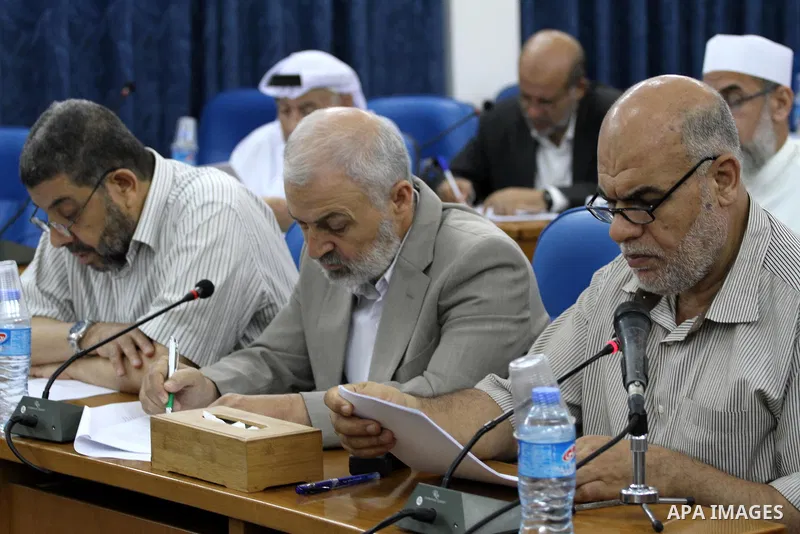 Members of the Palestinian legislative council from Hamas movement attend a meeting at the legislative council in Gaza city on July 29, 2015. Photo by Mohammed Asad