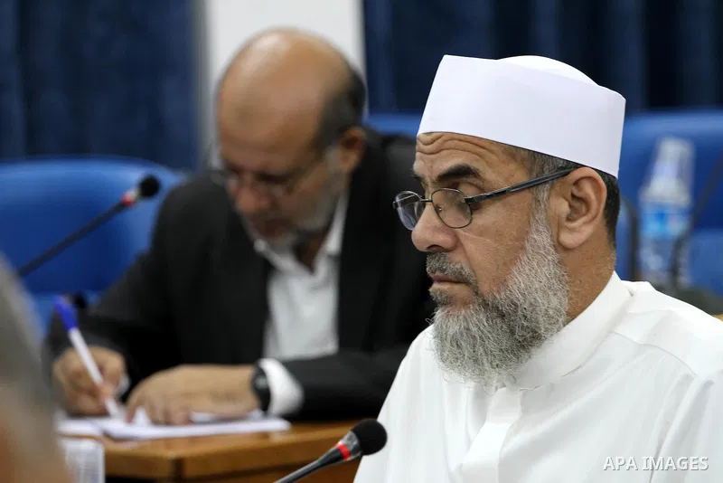 Members of the Palestinian legislative council from Hamas movement attend a meeting at the legislative council in Gaza city on July 29, 2015. Photo by Mohammed Asad