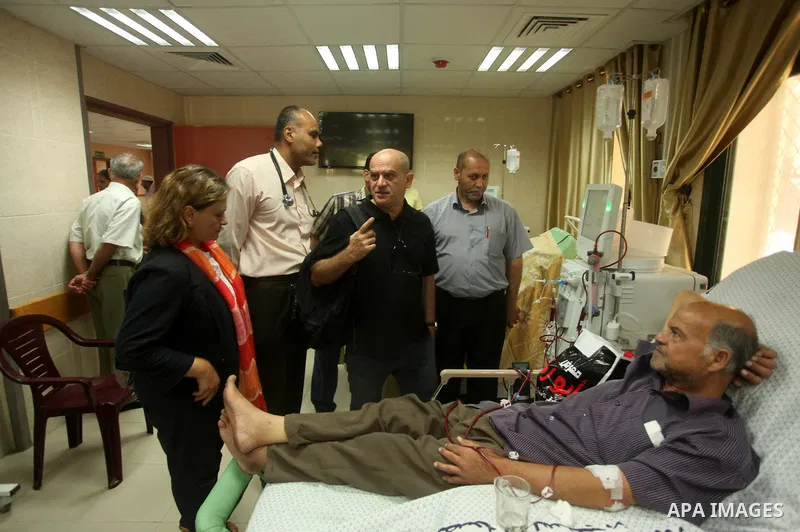 Head of the Red Cross mission in Israel and the Palestinian territories Jacques De Maio, visits the al-Aqsa Martyrs Hospital in Deir al-Balah in the northern Gaza Strip July 29, 2015. Photo by Ashraf Amra