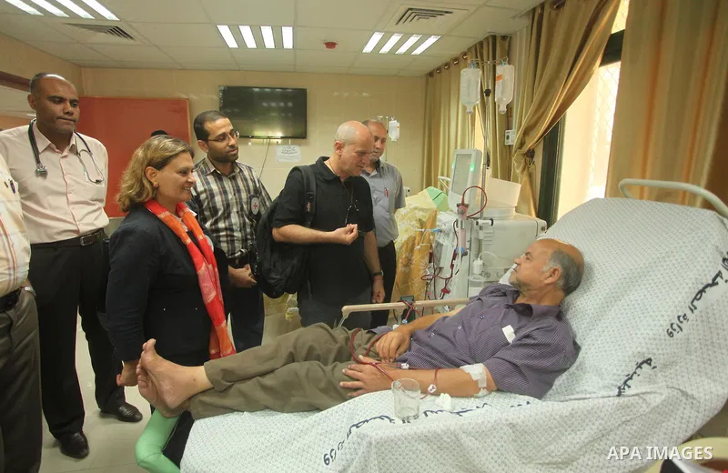 Head of the Red Cross mission in Israel and the Palestinian territories Jacques De Maio, visits the al-Aqsa Martyrs Hospital in Deir al-Balah in the northern Gaza Strip July 29, 2015. Photo by Ashraf Amra