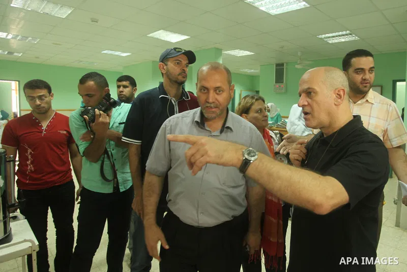 Head of the Red Cross mission in Israel and the Palestinian territories Jacques De Maio, visits the al-Aqsa Martyrs Hospital in Deir al-Balah in the northern Gaza Strip July 29, 2015. Photo by Ashraf Amra