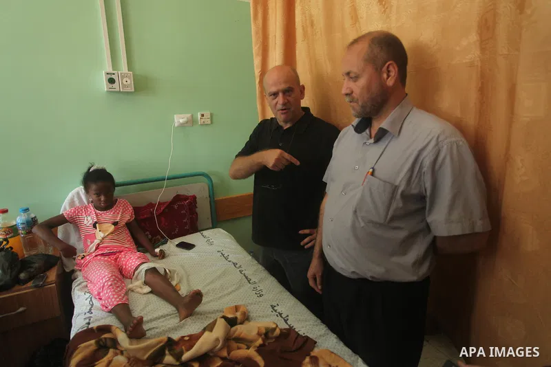 Head of the Red Cross mission in Israel and the Palestinian territories Jacques De Maio, visits the al-Aqsa Martyrs Hospital in Deir al-Balah in the northern Gaza Strip July 29, 2015. Photo by Ashraf Amra