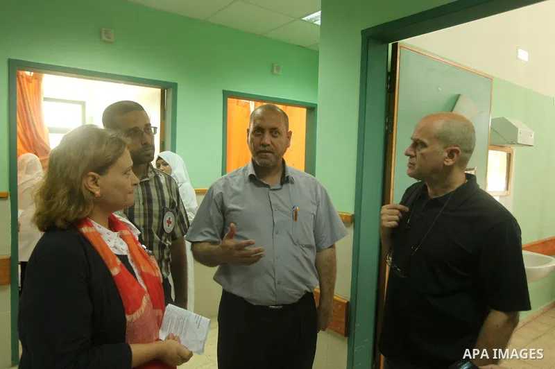 Head of the Red Cross mission in Israel and the Palestinian territories Jacques De Maio, visits the al-Aqsa Martyrs Hospital in Deir al-Balah in the northern Gaza Strip July 29, 2015. Photo by Ashraf Amra
