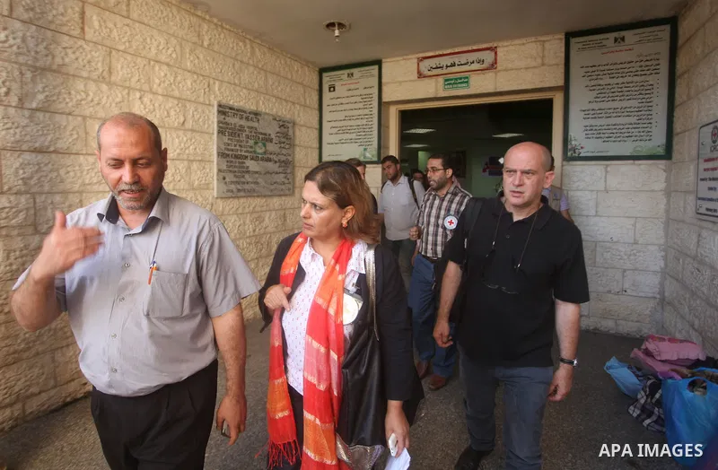 Head of the Red Cross mission in Israel and the Palestinian territories Jacques De Maio, visits the al-Aqsa Martyrs Hospital in Deir al-Balah in the northern Gaza Strip July 29, 2015. Photo by Ashraf Amra