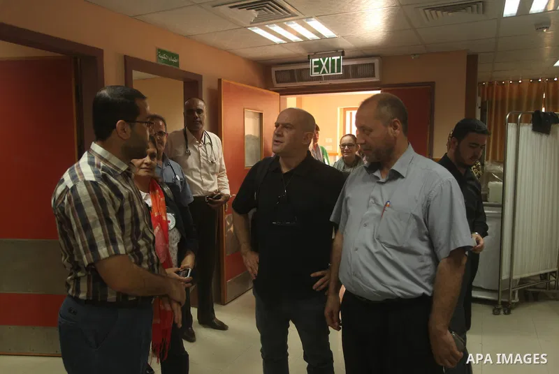 Head of the Red Cross mission in Israel and the Palestinian territories Jacques De Maio, visits the al-Aqsa Martyrs Hospital in Deir al-Balah in the northern Gaza Strip July 29, 2015. Photo by Ashraf Amra
