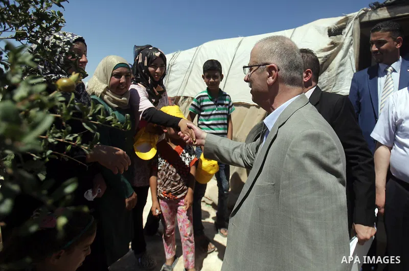 Palestinian prime minister Rami Hamadallah visits the village of Susia outside the West Bank village of Yatta, on June 29, 2015. Photo by Prime Minister Office