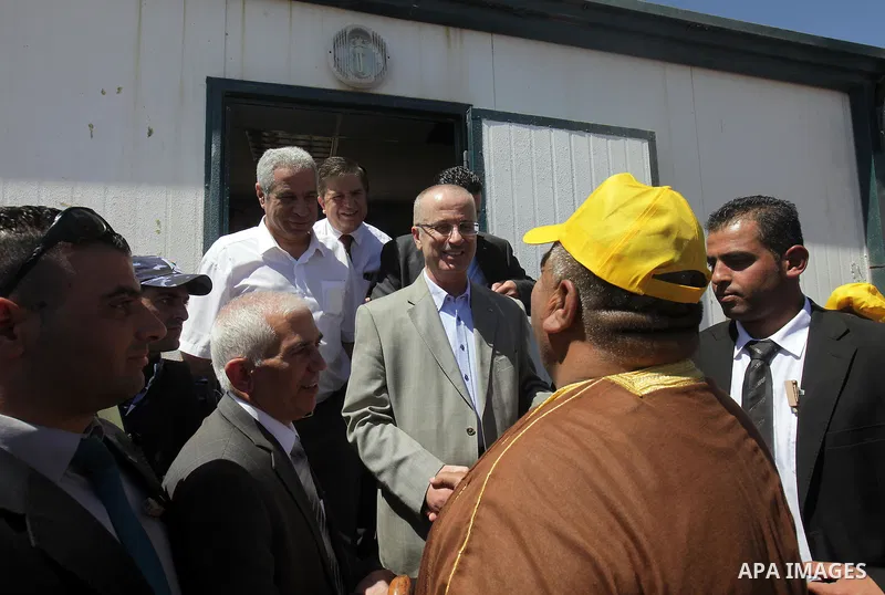 Palestinian prime minister Rami Hamadallah visits the village of Susia outside the West Bank village of Yatta, on June 29, 2015. Photo by Prime Minister Office