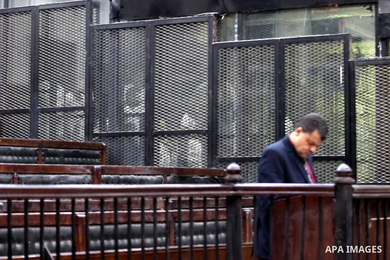 Members of Egyptian 'Ultras of Raba'wi' attend their trial in a court in Cairo on July 29, 2015. Photo by Amr Sayed