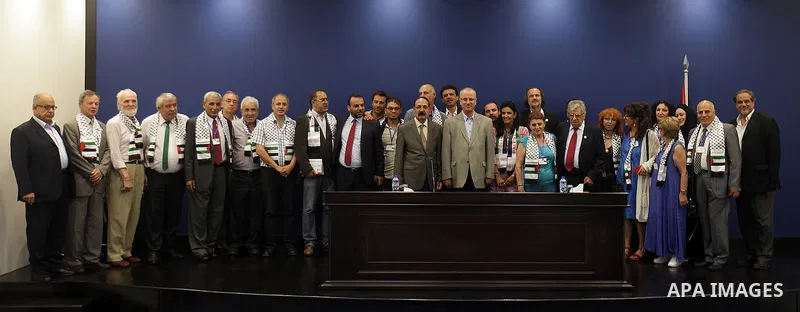 Palestinian Prime Minister Rami Hamdallah meets with a delegation of Russian, Spanish and Palestinian writers and authors, in the West Bank city of Ramallah on July 29, 2015. Photo by Prime Minister Office
