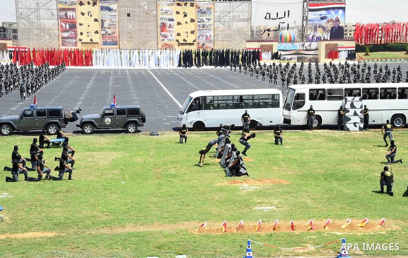 Egyptian police officers demonstrate their skills during at the police academy in Cairo, Egypt July 29, 2015. Photo by Egyptian President Office