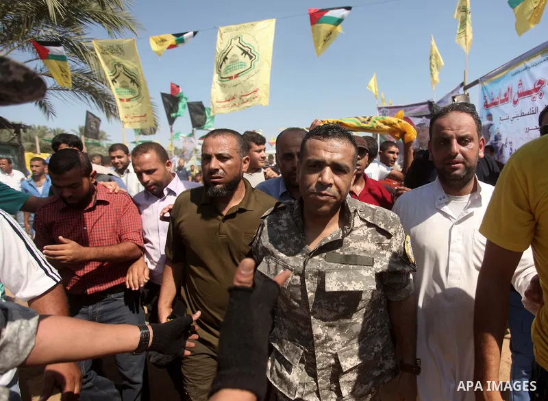Freed Palestinian prisoner Mahmoud Abu Amra is welcomed by relatives upon his release from an Israeli jail, in Deir al-Balah in the central Gaza Strip, July 30, 2015. Abu Amra served 12 years in the Israeli jail after he...