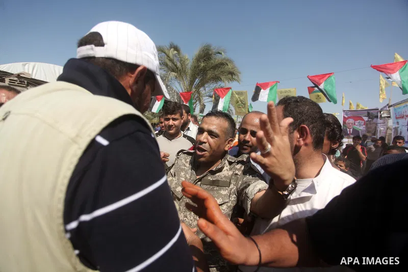 Freed Palestinian prisoner Mahmoud Abu Amra is welcomed by a relative upon his release from an Israeli jail, at his home in Deir al-Balah in the central Gaza Strip, July 30, 2015. Abu Amra served 12 years in the Israeli...