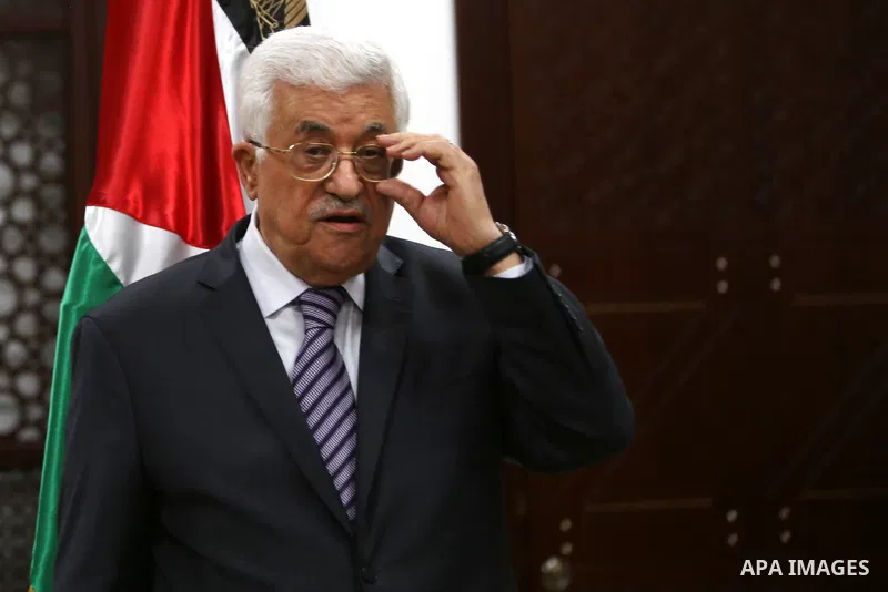 Palestinian President Mahmoud Abbas speaks to journalists during a news conference in his headquarters in the West Bank city of Ramallah July 31, 2015. Suspected Jewish attackers torched a Palestinian home in the occupie...