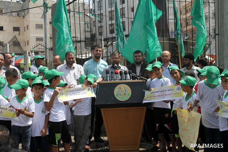 Hamas spokesman Sami Abu Zuhri, speaks during a press conference to announce the start of summer camps organized by the Hamas movement in Gaza city on August 1, 2015. Photo by Mohammed Asad