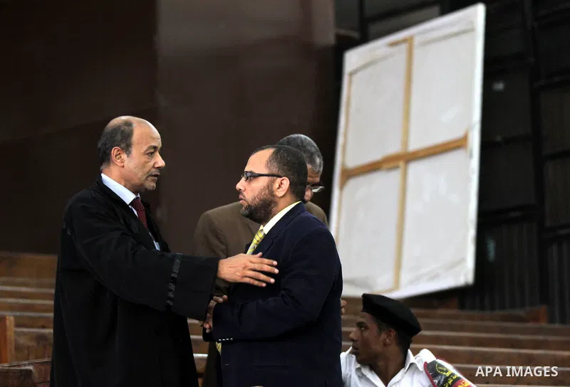 An Egyptian Lawyer attends the trial of Egyptian radical Islamist Mohammed al-Zawahiri, the brother of Al-Qaeda chief Ayman al-Zawahiri with 68 other defendants, at a court in Cairo on August 01, 2015. Photo by Amr Sayed