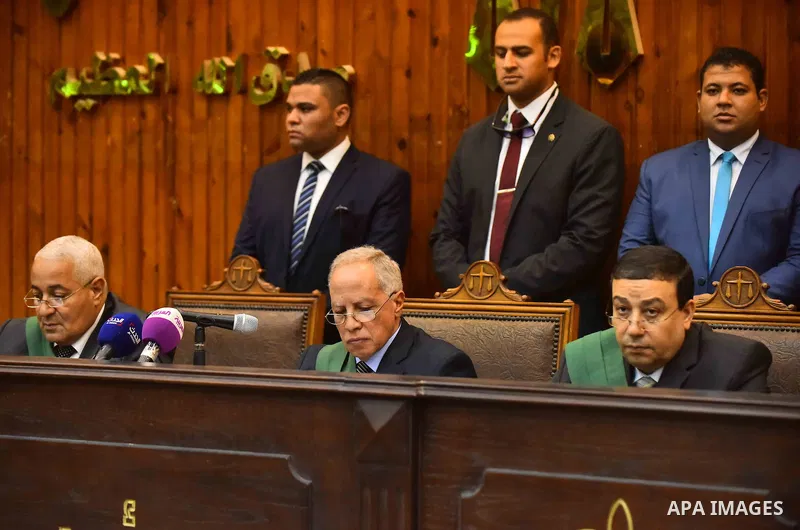 Egyptian Judge attends the trial of defendants in Boulaq riots case at a court in Cairo on August 01, 2015. Cairo Criminal Court delayed the trial of 379 Muslim Brotherhood (MB) members over charges of illegal possession...