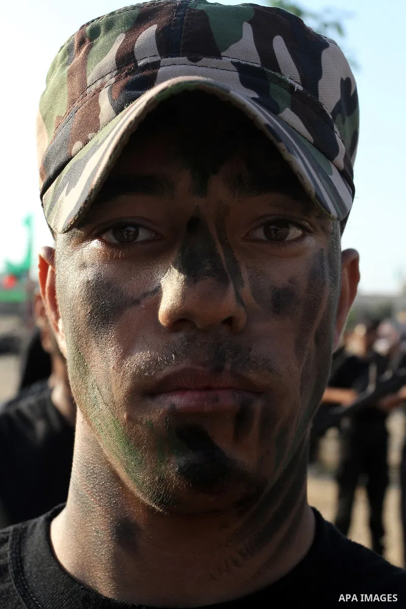 Palestinian youths demonstrate their skills during a military-style exercise at the Liberation Youths summer camp, organised by the Hamas movement, in Rafah in the southern Gaza Strip August 1, 2015. Hamas stages dozens...