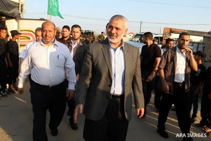 Senior Hamas leader Ismail Haniyeh arrives to Liberation Youths summer camp, organised by the Hamas movement, in Rafah in the southern Gaza Strip, August 1, 2015. Hamas stages dozens of military-style summer camps for yo...
