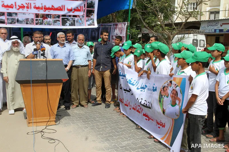 Hamas spokesman Sami Abu Zuhri, speaks during a photo exhibition in Rafah in the southern Gaza strip, on August 2, 2015. Photo by Abed Rahim Khatib
