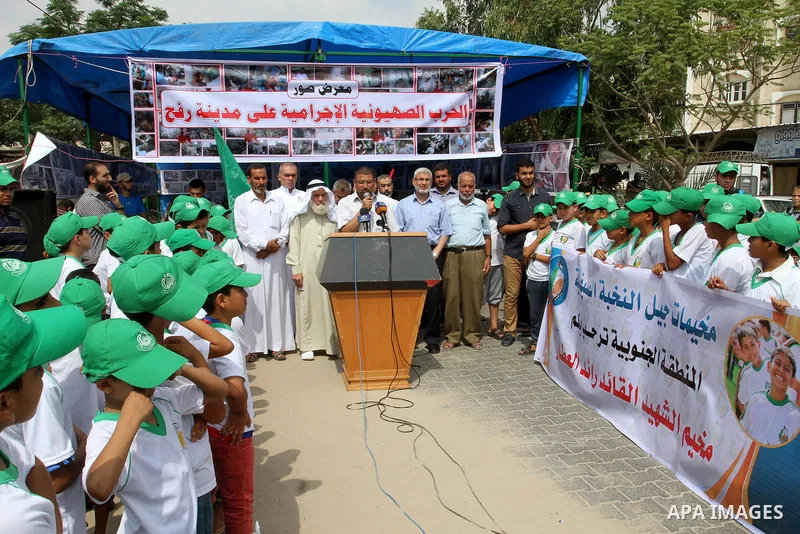 Hamas spokesman Sami Abu Zuhri, speaks during a photo exhibition in Rafah in the southern Gaza strip, on August 2, 2015. Photo by Abed Rahim Khatib